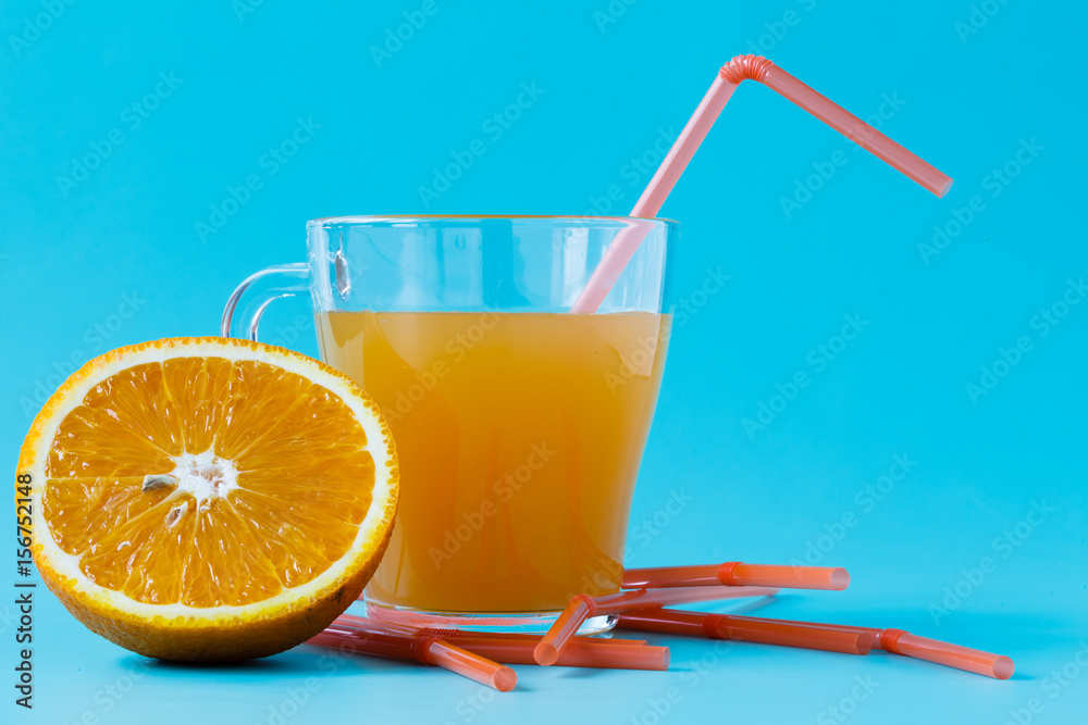 Glass of orange juice and fresh oranges Glass of orange juice and fresh oranges