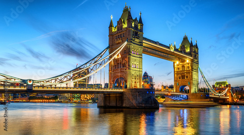 illuminated Tower Bridge during sunset dusk