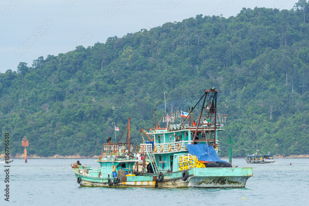 Fisherman boats anchored at Kota Kinabalu (KK). KK is a major city with unquestionably some of the best beaches on the Borneo island.
