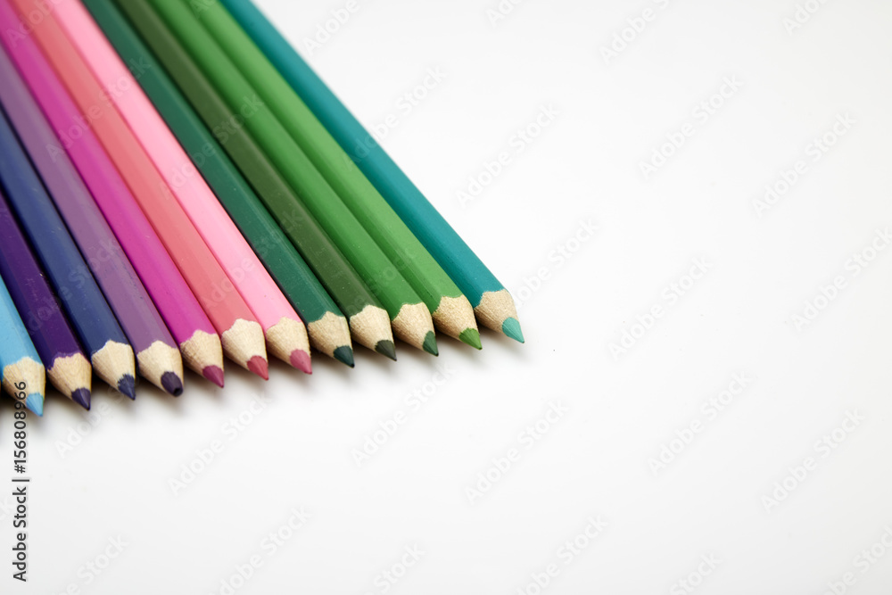 Many different colored pencils on white background Many different colored pencils on white background