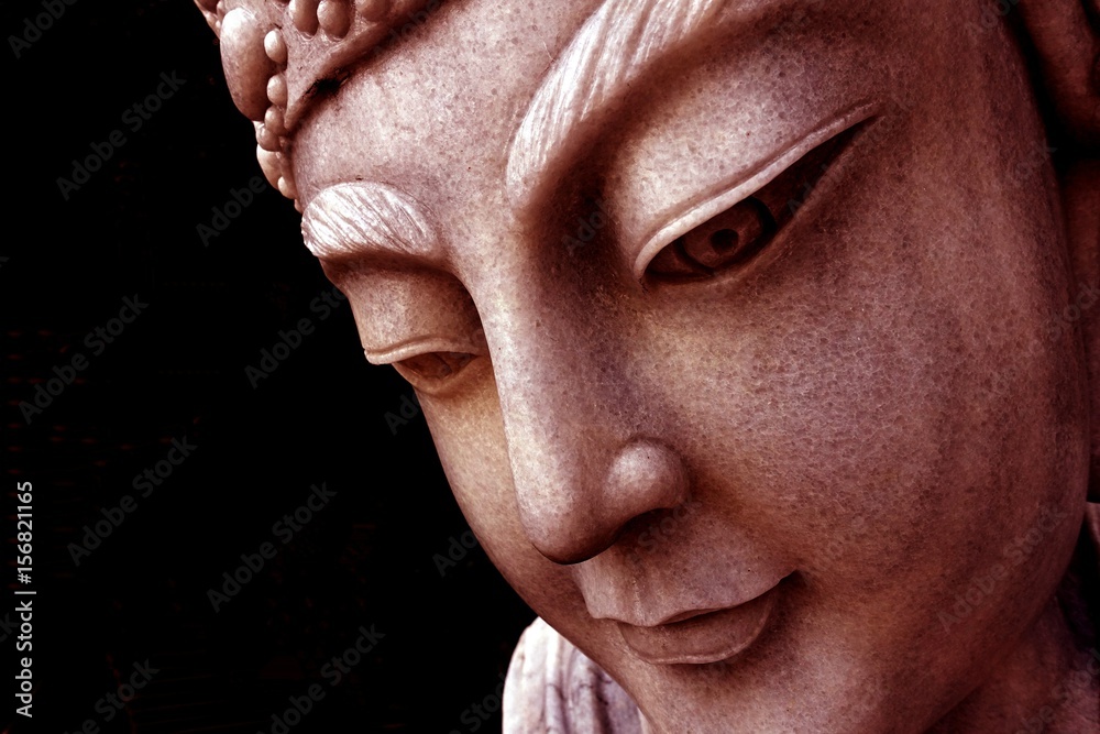 Obraz premium Stone Buddha Face