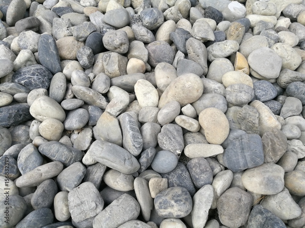 Pebble stone background, outdoor natural river white grey rock pebble medium size, abstract dry garden round stones texture background, Material for construction, numerous pile pebble Pebble stone background, outdoor natural river white grey rock pebble medium size, abstract dry garden round stones texture background, Material for construction, numerous pile pebble