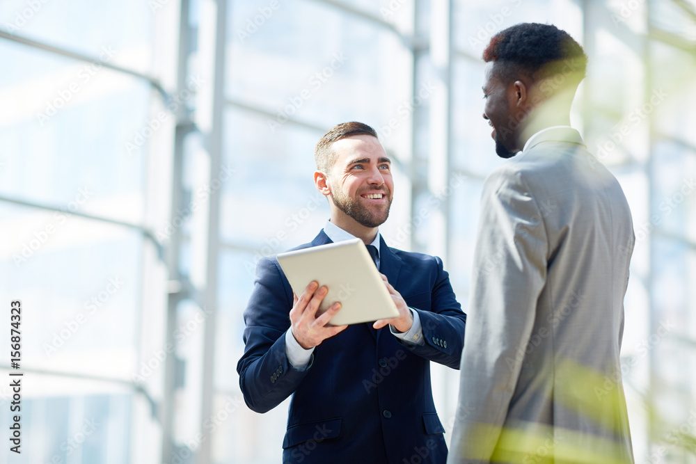Successful traders discussing financial data online Successful traders discussing financial data online