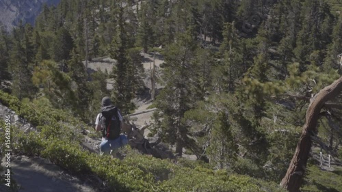 Slow Motion Backpacker alone hiking in the mountains