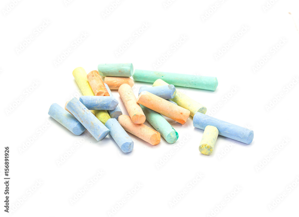 Grungy broken pieces of Thick colored chalk isolated on white background. Grungy broken pieces of Thick colored chalk isolated on white background.
