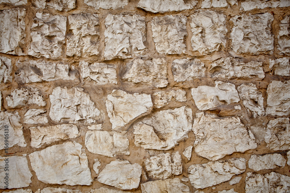 Part of a stone wall . Background or texture Part of a stone wall . Background or texture