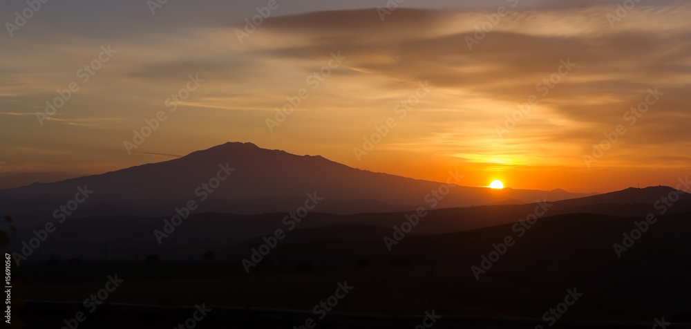 Sunrise over mount Etna - tallest active volcano in Europe. Sicily, Italy