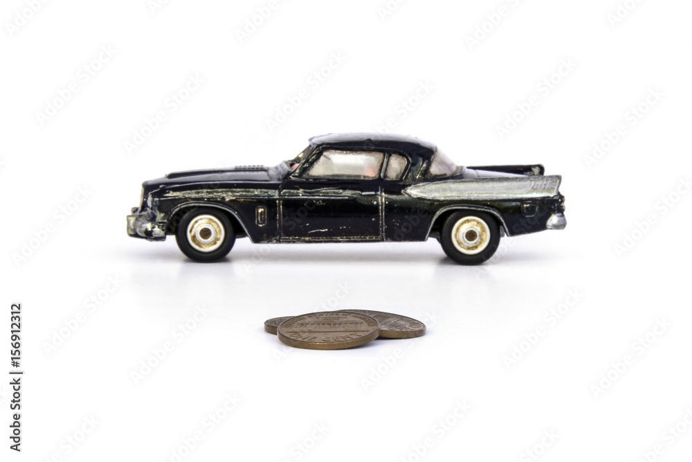 broken car and coins