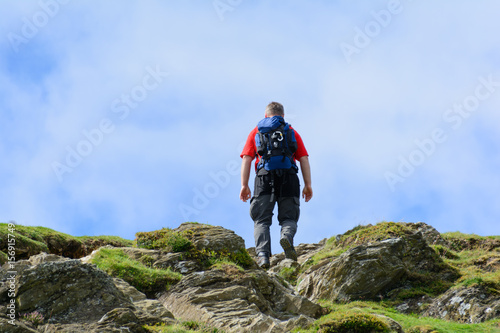 man on the hike on the top of the mountain