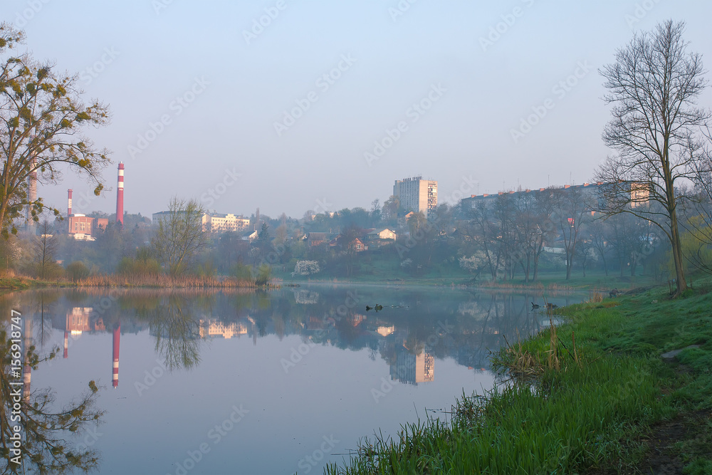 Obraz premium factory at river dam