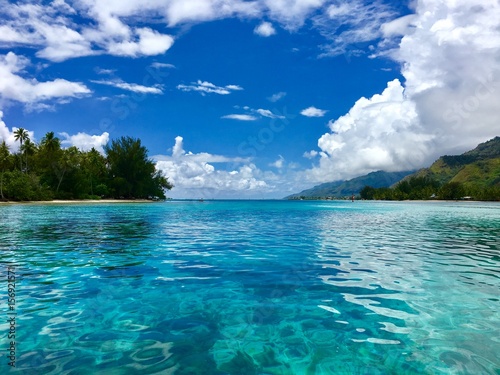 Beautiful view on the turquoise lagoon of Moorea and its Motus, Moorea, Tahiti, French Polynesia photo