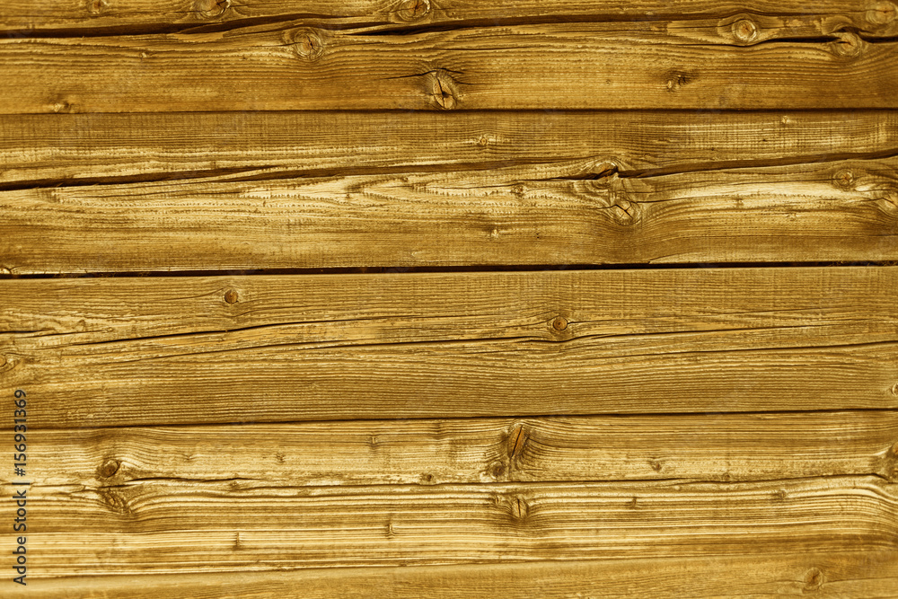 Natural yellow colored pine wood panels as background Natural yellow colored pine wood panels as background
