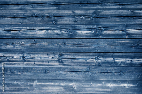 Natural bluecolored pine wood panels as background photo