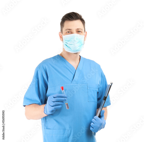 Male surgeon with test tube...