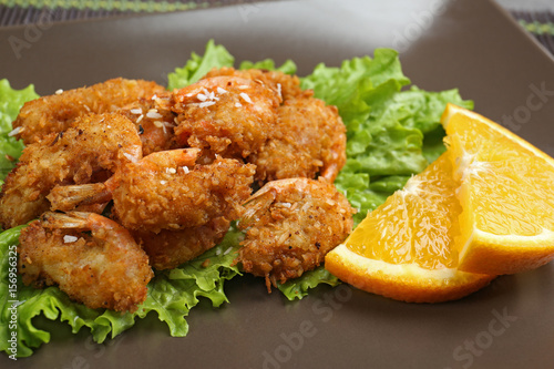 Photos Plate with delicious coconut shrimps, closeup