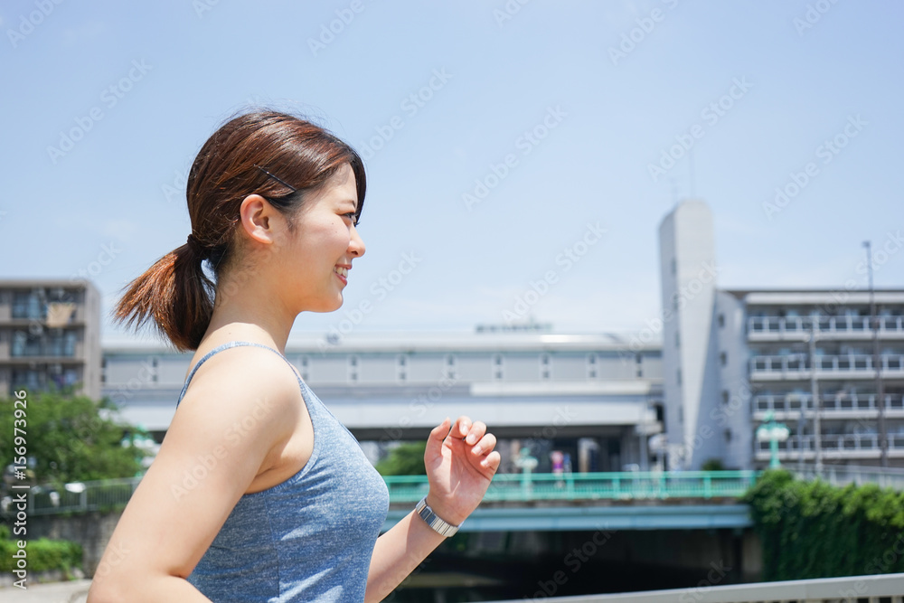 Young woman running with smile Young woman running with smile