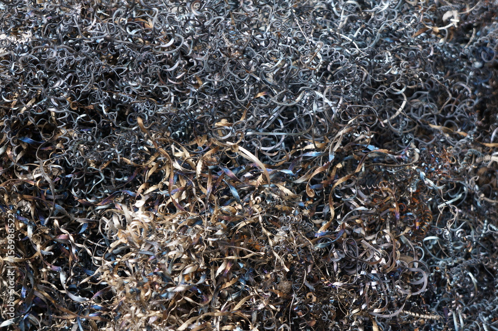 Steel shavings of black metal with rusty elements Steel shavings of black metal with rusty elements