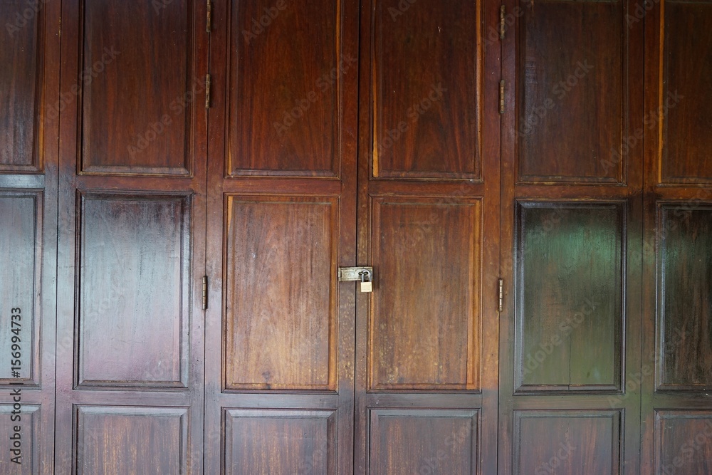 Ancient wooden doors are the artwork of the local people.