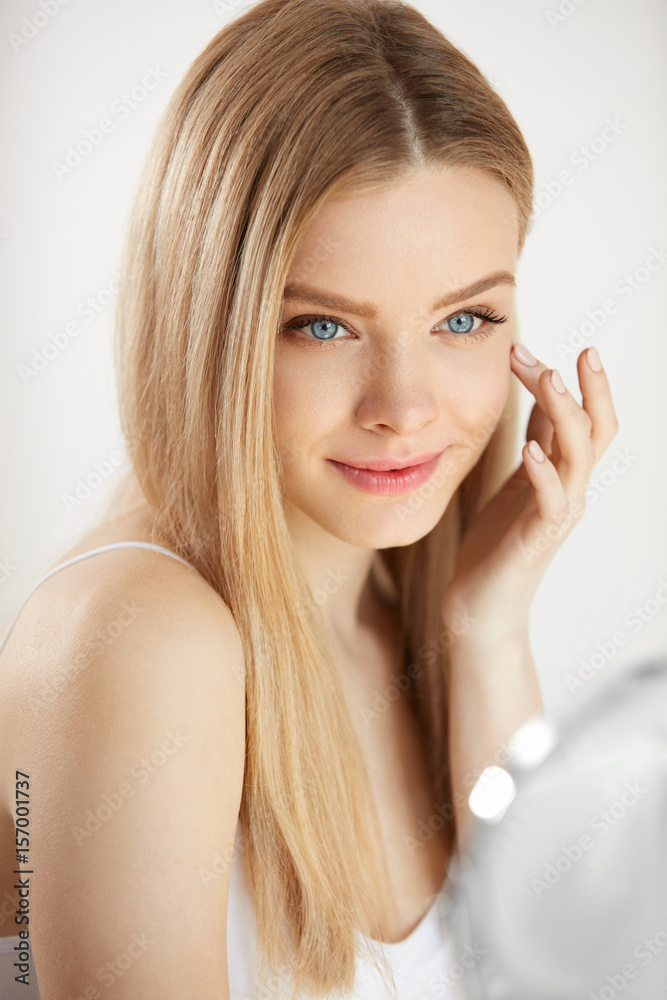 Beauty Face Care. Girl With Healthy Skin Looking In The Mirror Beauty Face Care. Girl With Healthy Skin Looking In The Mirror