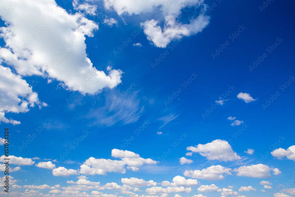 blue sky background with tiny clouds blue sky background with tiny clouds