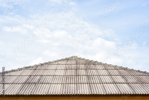 The roof of the house with blue sky