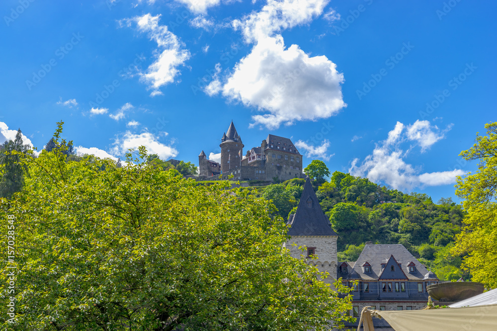 Street view with romantic houses of Bacharach /  Rhine and castle Stahleck. Rhineland-Palatinate. Germany.