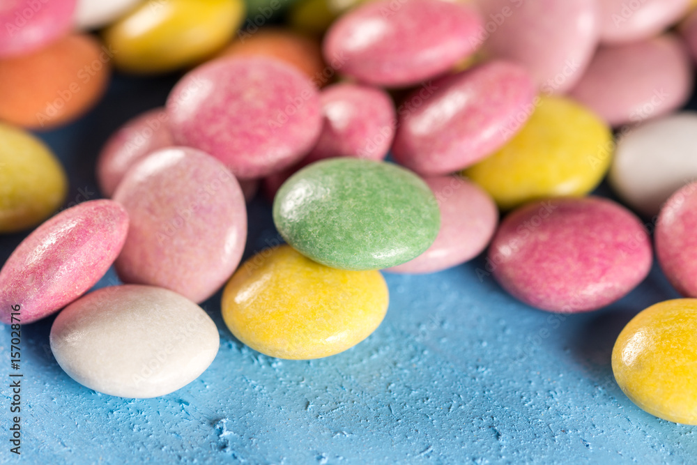 Closeup macro colorful round candies with blurred background Closeup macro colorful round candies with blurred background