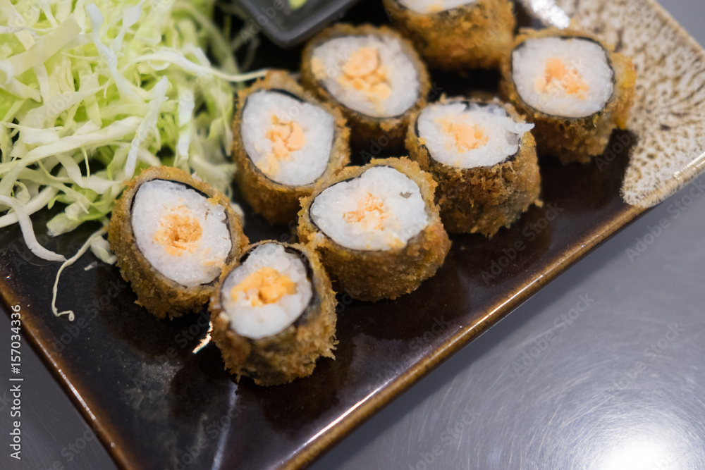 Sushi Roll with salmon in a beautiful plate Sushi Roll with salmon in a beautiful plate