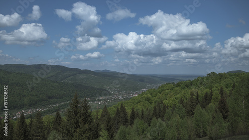The mountain landscape on the background of the town