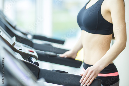 The athletic woman on the running track in the gym © realstock1