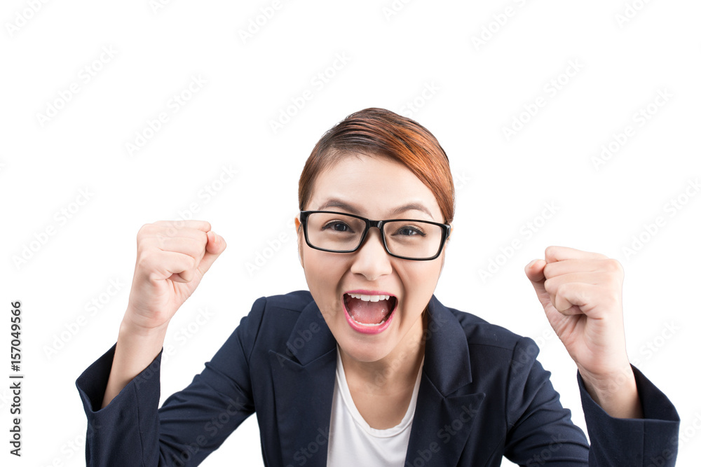 Close-up of an excited businesswoman celebrating with arms up Close-up of an excited businesswoman celebrating with arms up