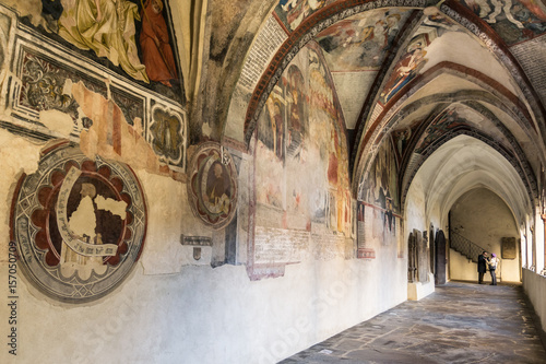 Cathedral cloister with the frescoed wall.