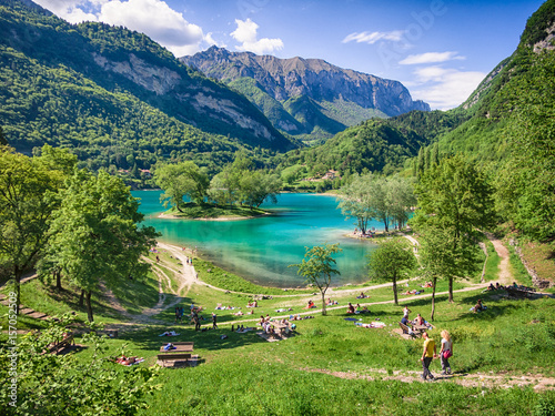 Lake Tenno surrounded by Italian alps.
