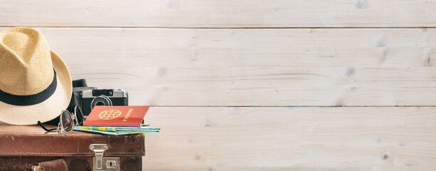 Travel concept on wooden background - copy space