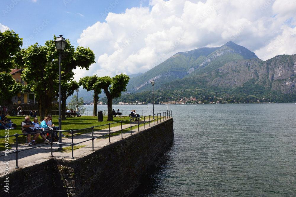Amazing panorama with white clouds of Bellagio town on Lake Como, Italy 