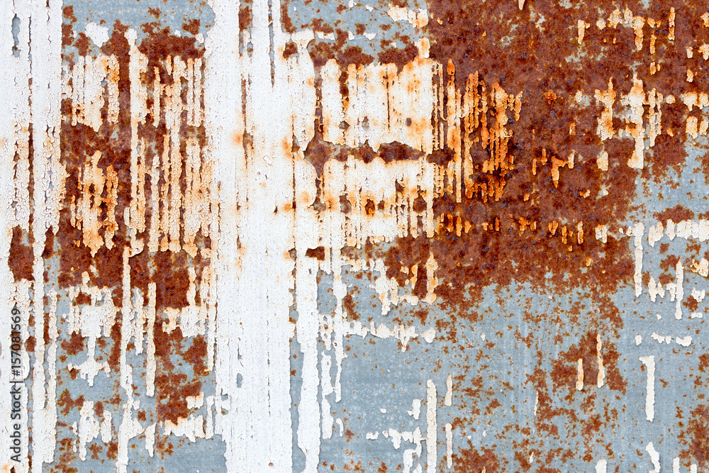 A background of peeling paint and rusty old metal