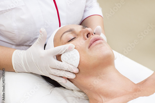 Process cosmetic mask of massage and facials in beauty salon 
