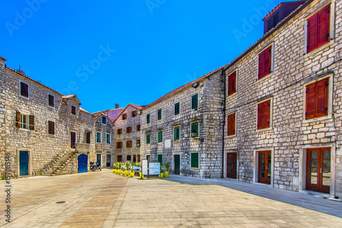Colorful ancient square in Starigrad place, summer travel destination in Croatia, Iland Hvar scenery.