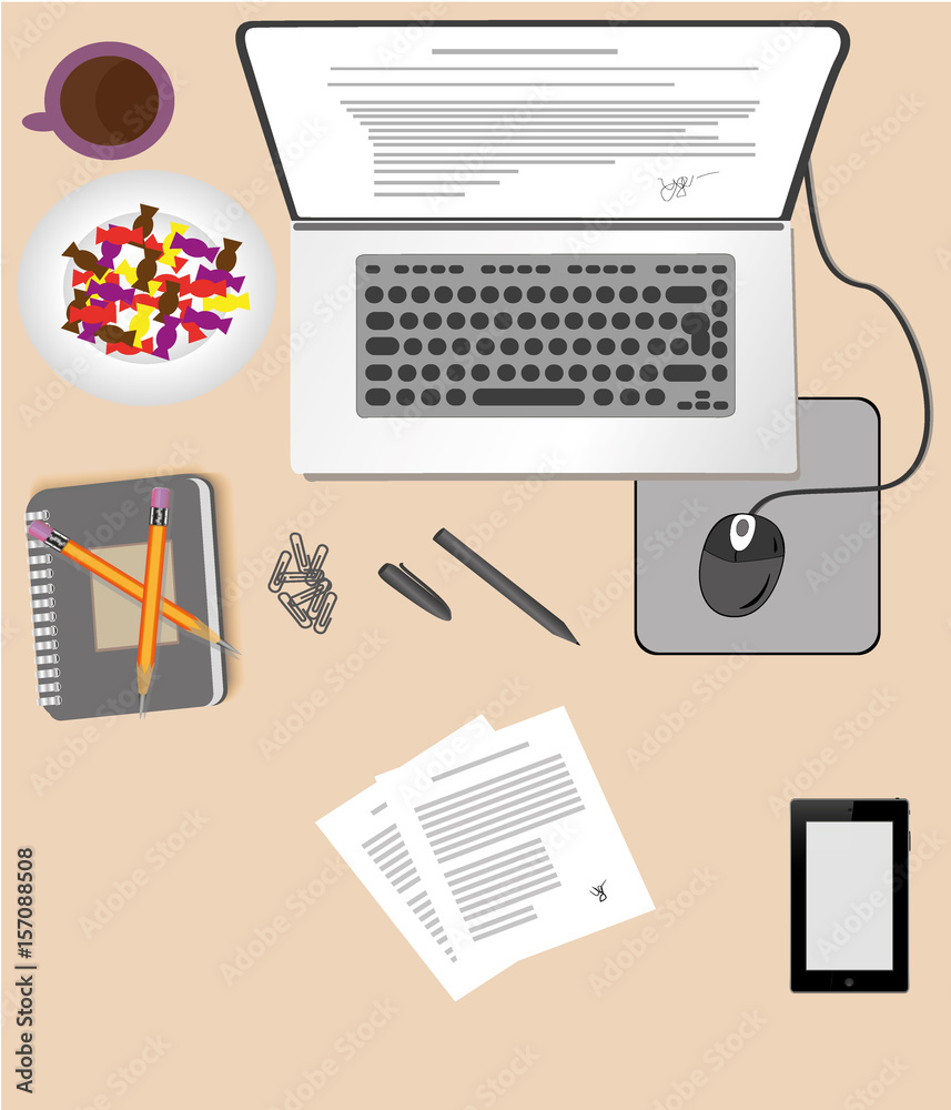The laptop on the Desk next to notebook with documents. Is a Cup of coffee and a candy dish. Phone near the laptop. The laptop on the Desk next to notebook with documents. Is a Cup of coffee and a candy dish. Phone near the laptop.