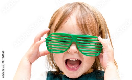 Happy toddler girl wearing shutter shades
