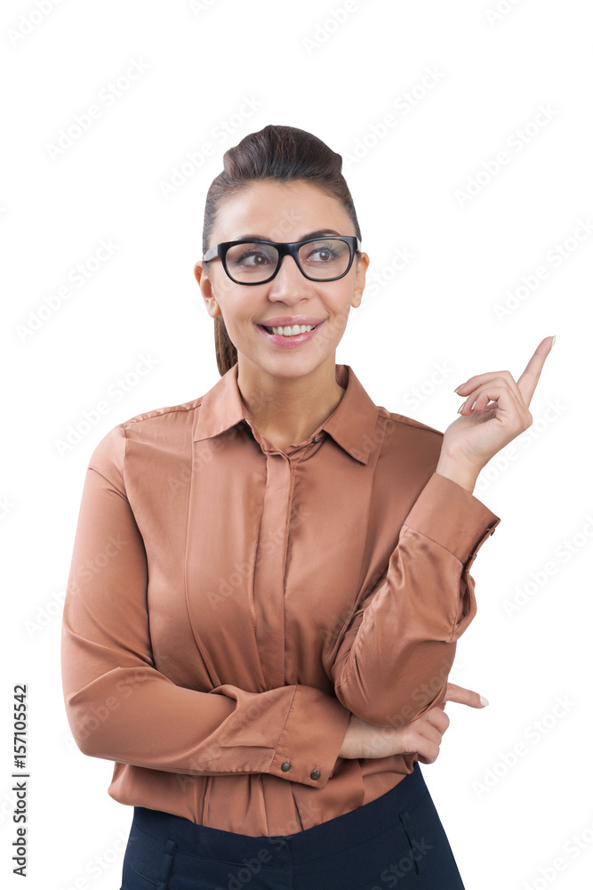 Smiling woman in glasses showing upwards isolated Smiling woman in glasses showing upwards isolated