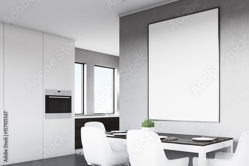 Side view of gray kitchen with poster