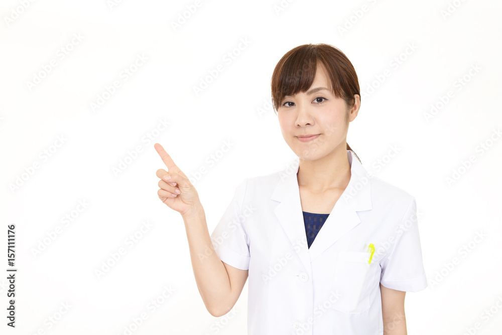 指示する笑顔の薬剤師 指示する笑顔の薬剤師