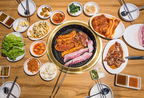 Korean BBQ Raw Beef, pork and Vegetables on the wooden table