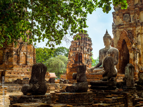 Only intact ancient Buddha statue among the destroyed statues in Ayutthaya historical park  Thailand.