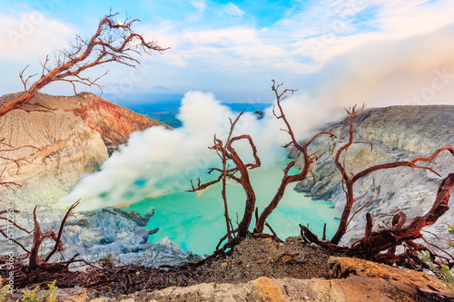 Panoramic view of Kawah Ijen Volcano at Sunrise. The Ijen volcano complex is a group of stratovolcanoes in the Banyuwangi Regency of East Java, Indonesia. photo