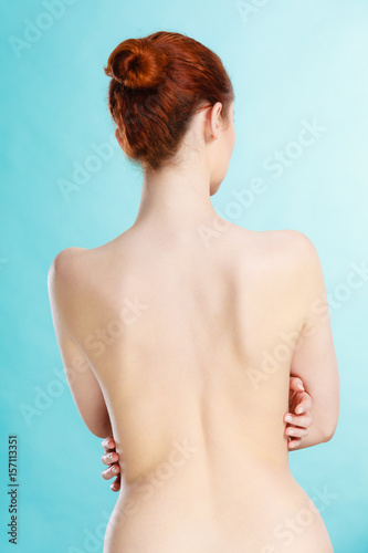 Young woman with naked back