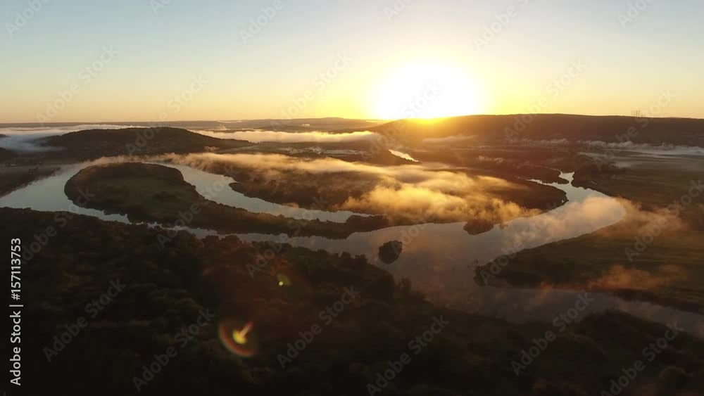 River valley heart bent early morning fog clouds Primorye, Vladivostok. Flight to yellow orange sunrise horizon. Wide open space Aerial drone drift beautiful Russian nature landscape. River valley heart bent early morning fog clouds Primorye, Vladivostok. Flight to yellow orange sunrise horizon. Wide open space Aerial drone drift beautiful Russian nature landscape.