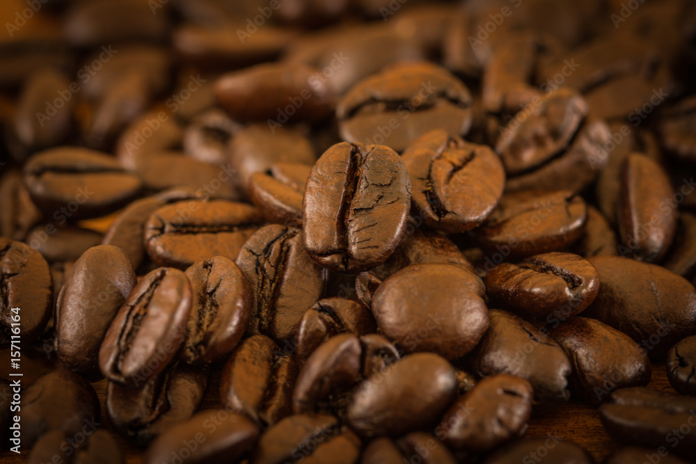 Close up of roasted coffee beans. Close up of roasted coffee beans.