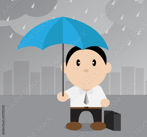 business man holding umbrella